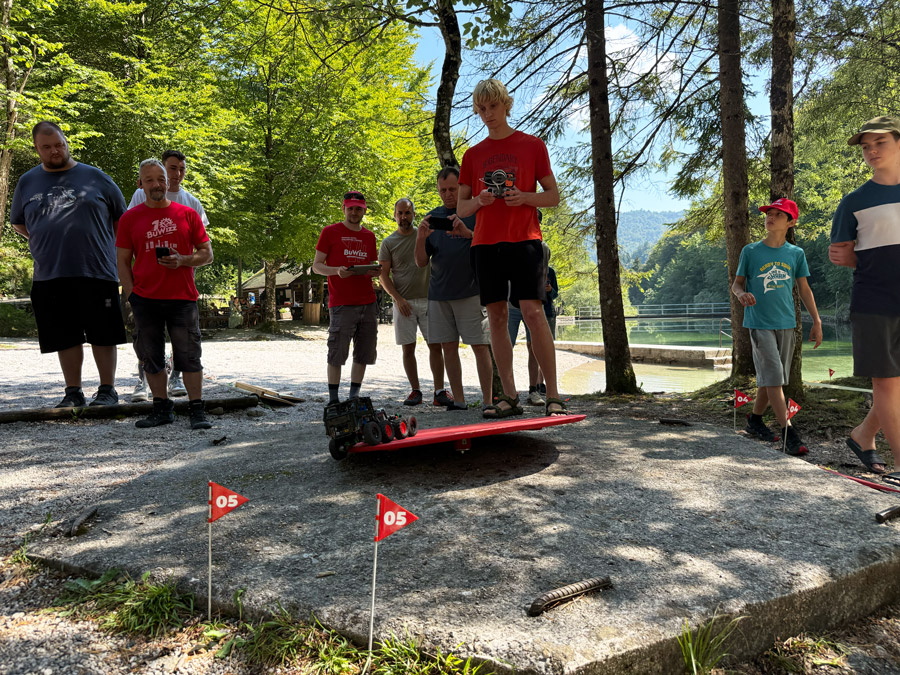 Trial truck competition beside the water at BuWizz Gathering 2026