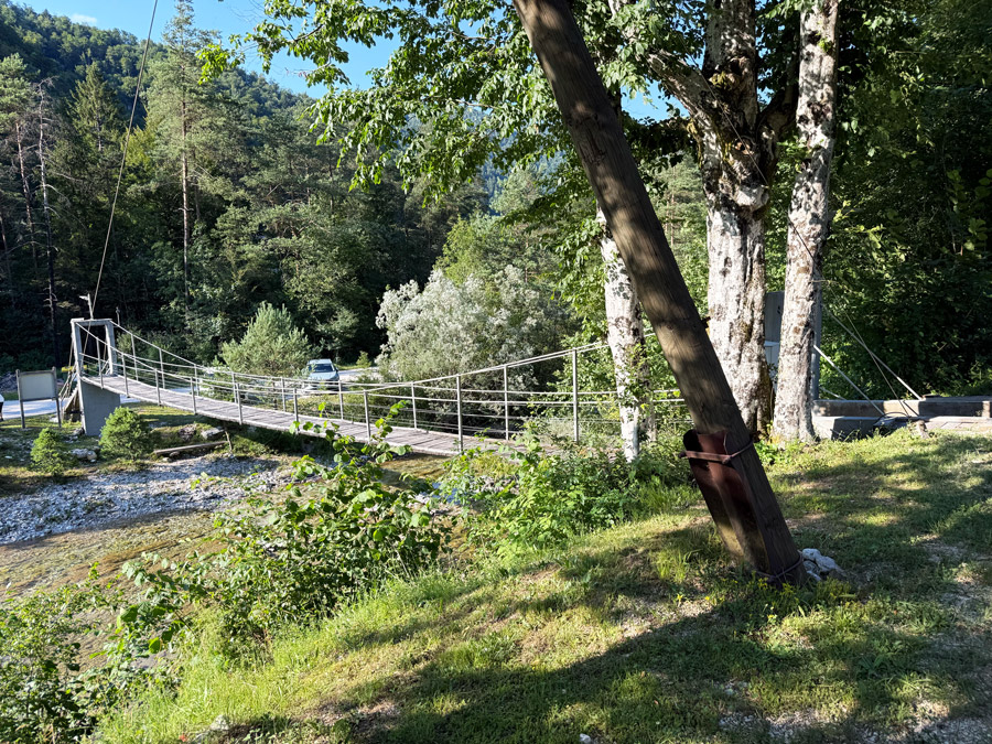 Suspension bridge over the river in Idrijska Bela, Slovenia