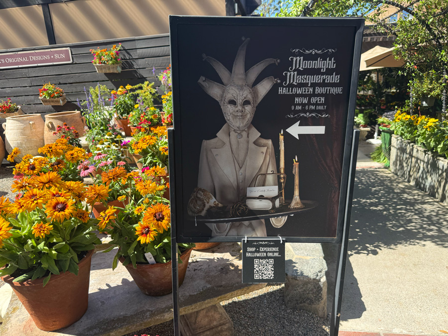 Moonlight Masquerade Halloween Boutique sign at Roger’s Gardens