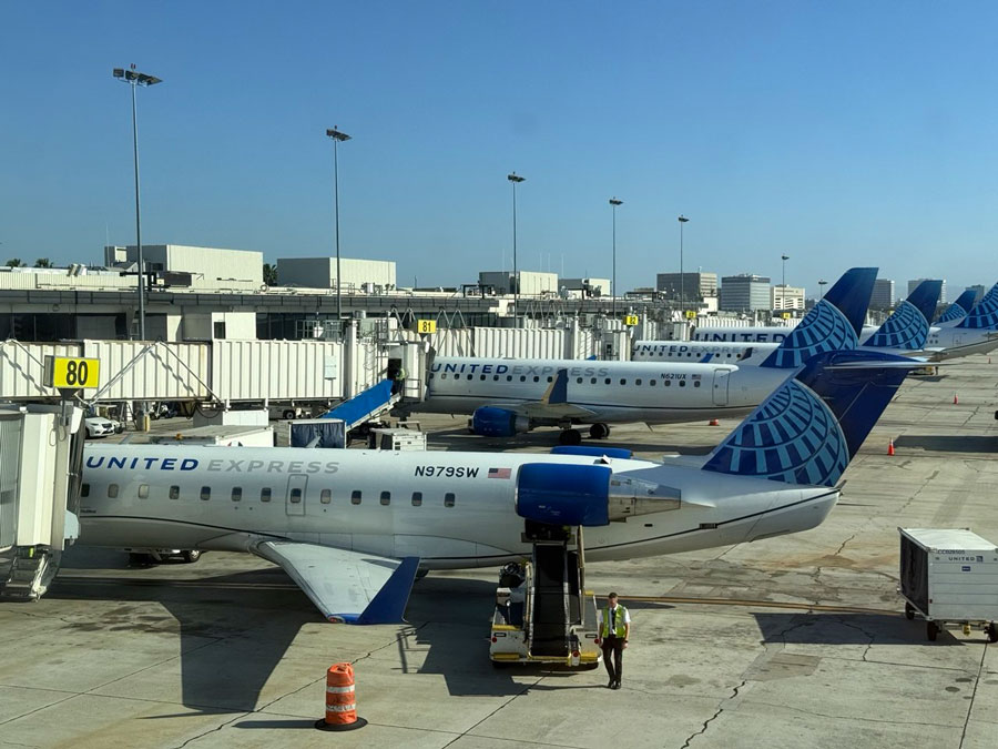 United Express aircraft parked at adjoining gates at LAX.